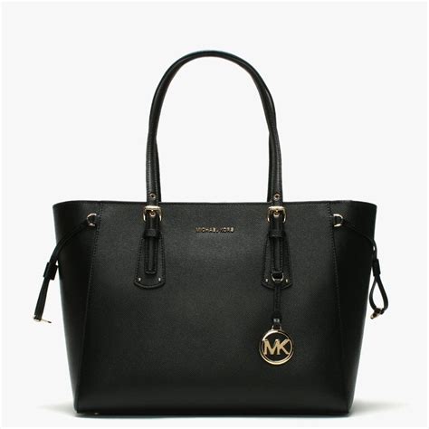 black tote purse michael kors|michael kors black leather bag.